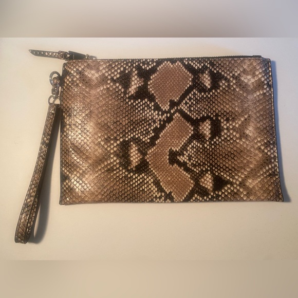 INC International Concepts Handbags - Reptile Print Wristlet. INC International Concepts. Like New Condition.